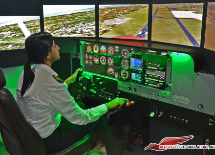 girl using flight simulator